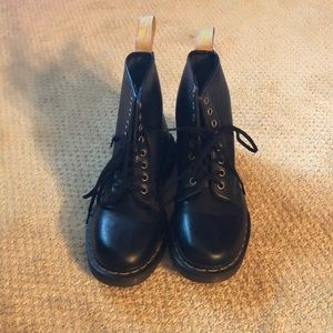 Dr. Martens, lightly worn.